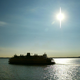One of the Staten Island Ferries (not necessarily the John F. Kennedy) makes its way across New York harbor